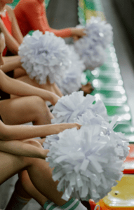 white cheerleader pom poms