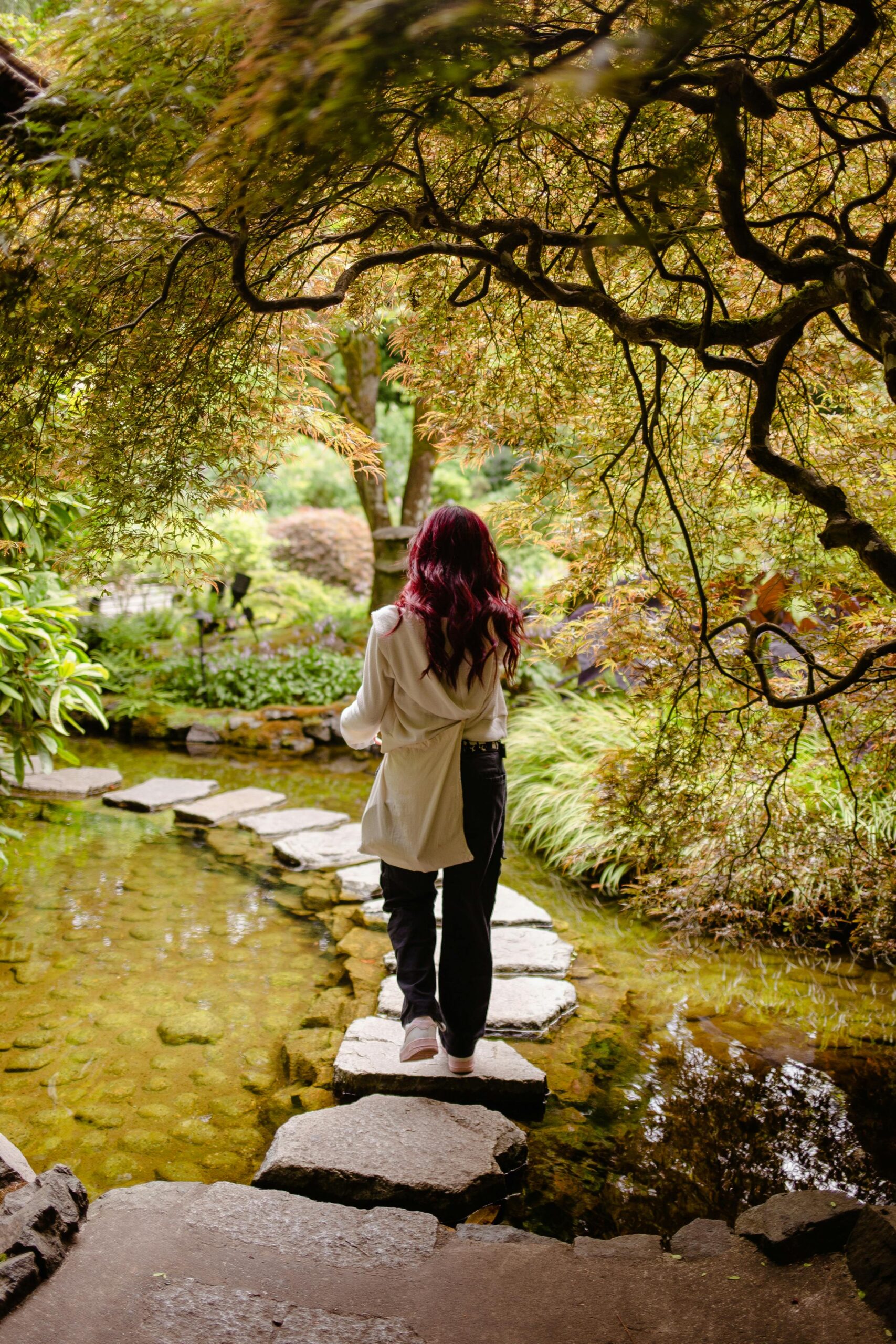 Warm photo of someone taking confident steps forward on a sunlit path